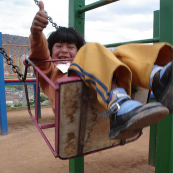 happy on a swing